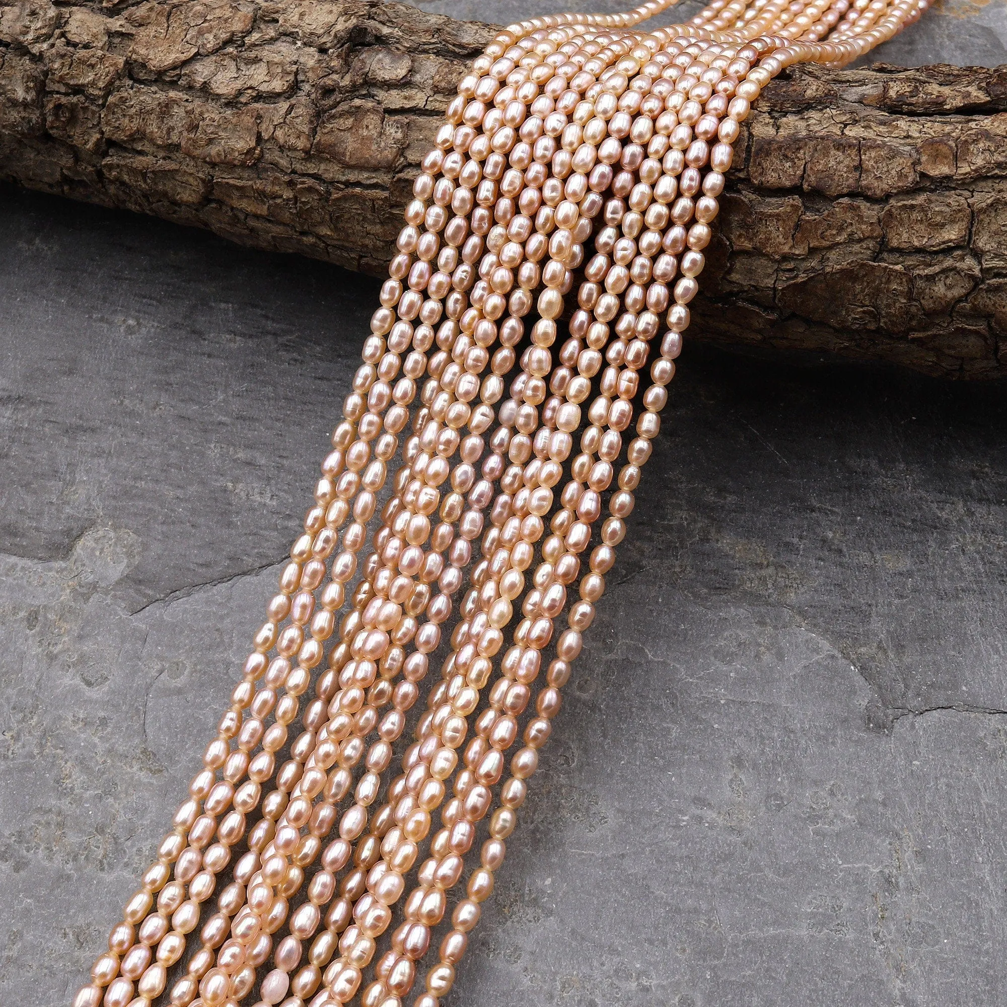 AAA Genuine Freshwater Small Pink Rice Seed Pearls 3mm Oval 15.5" Strand