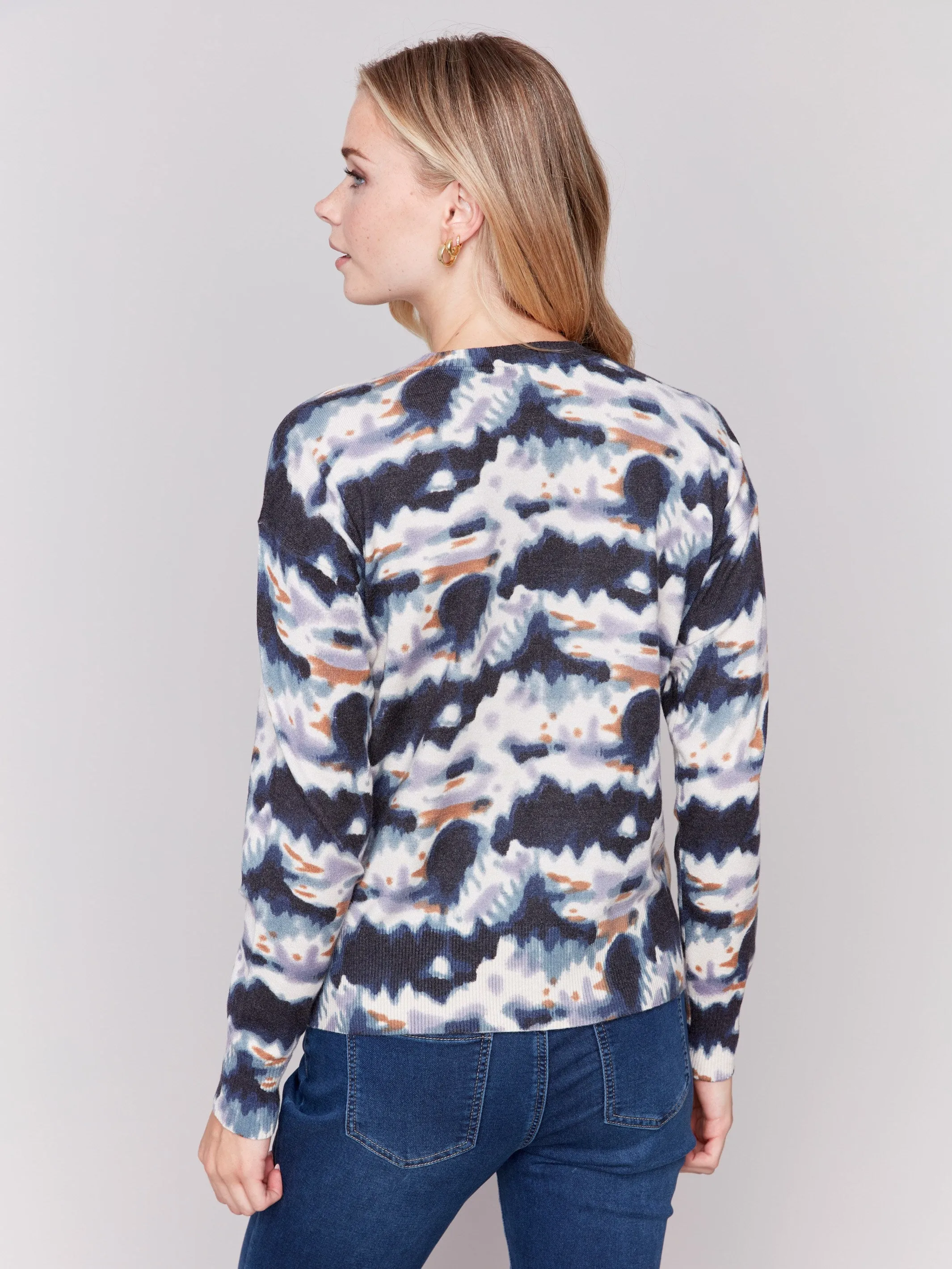 Here’s an optimized title for the e-commerce product:

Womens Tie-Dye Printed Sweater with Stylish Side Buttons - Trendy Casual Wear